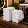Serviettes professionnelles Leny Beauty pliées en pile